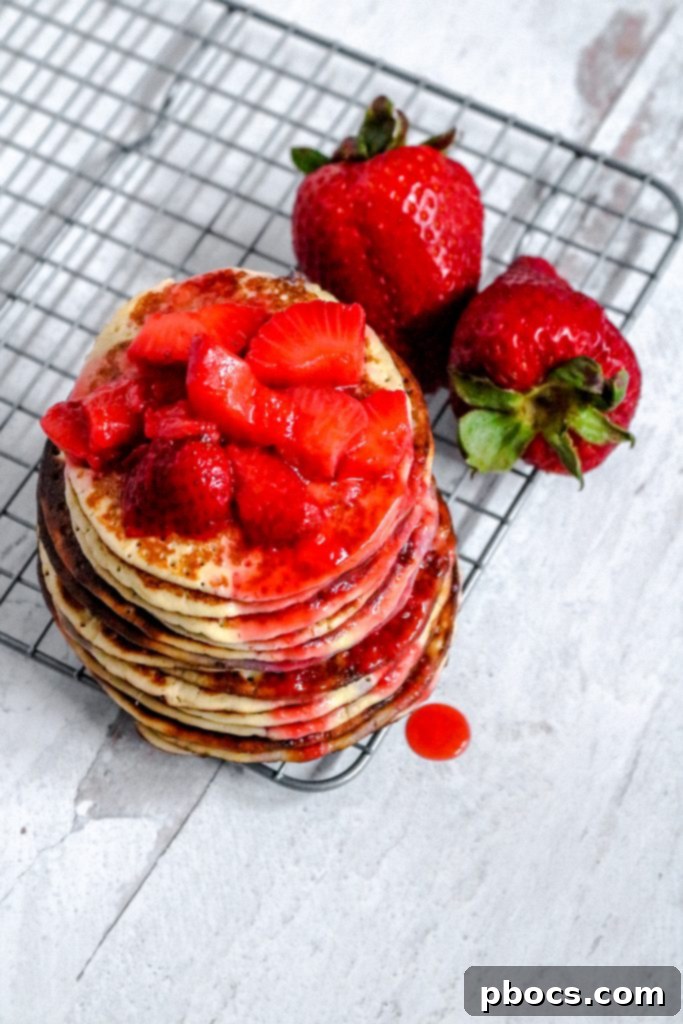 Keto Strawberry Pancakes with a variety of toppings