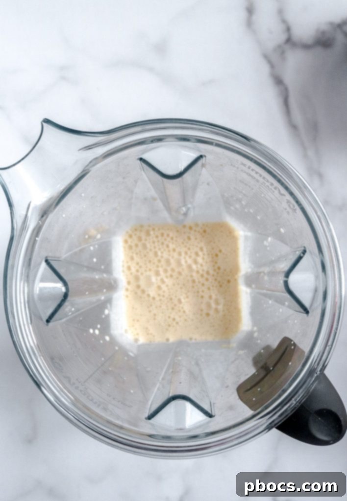 Blending keto pancake batter ingredients