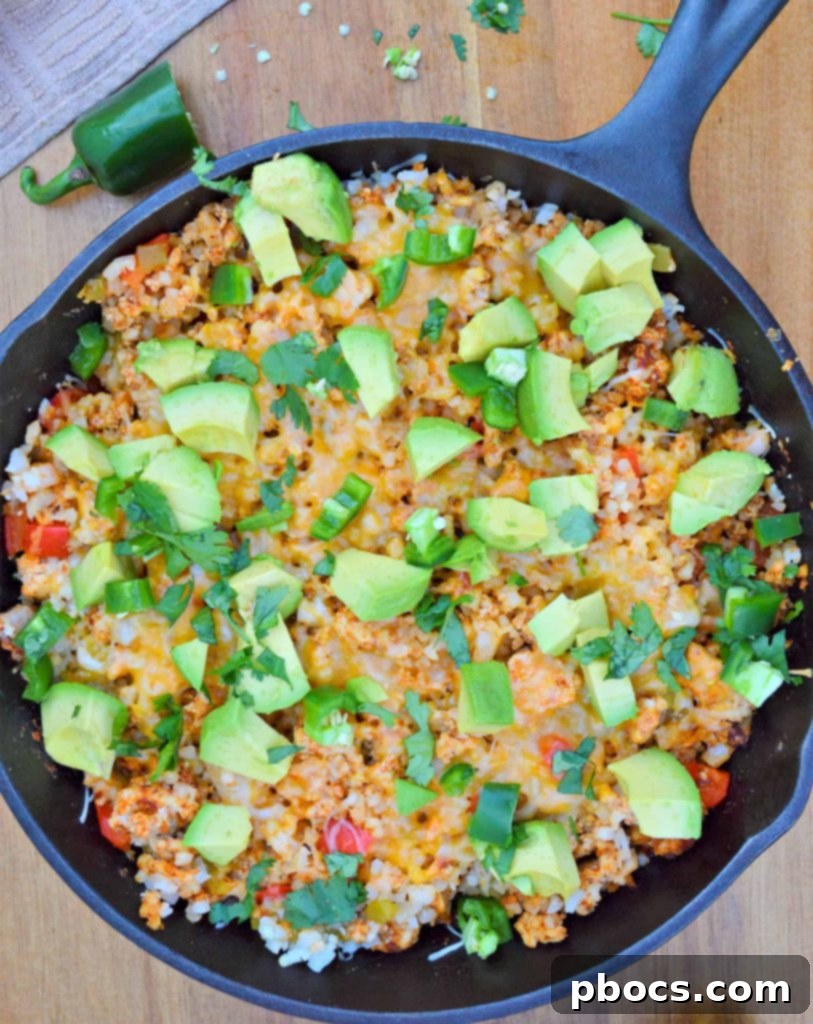 A sizzling Keto Turkey Mexican Skillet, packed with flavorful ground turkey, colorful bell peppers, and melted cheese, ready to be served.