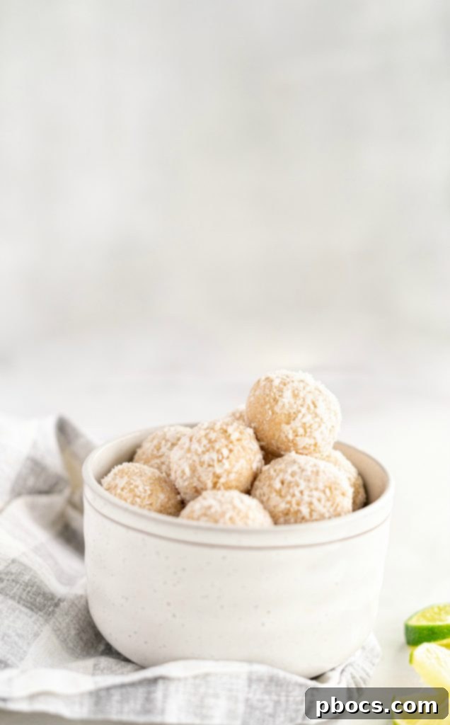 Refreshing Keto Key Lime Fat Bombs 2 Delicious and refreshing Keto Key Lime Fat Bombs arranged neatly on a plate, garnished with lime zest.