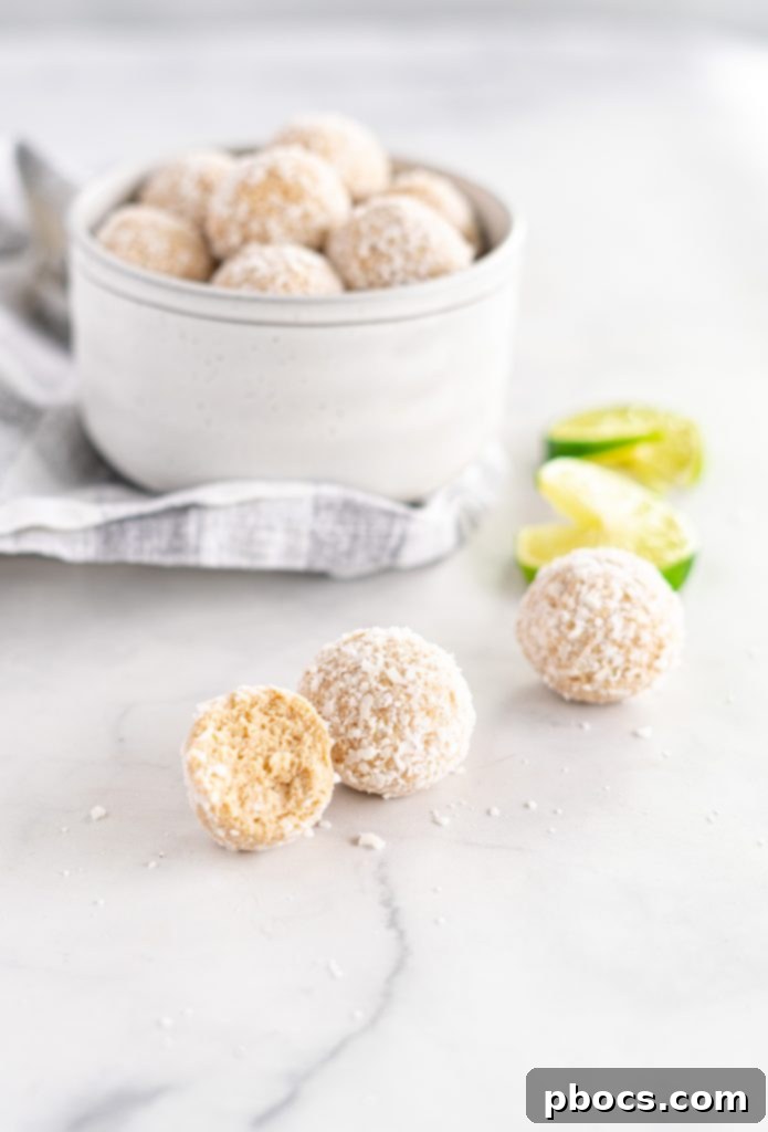 Refreshing Keto Key Lime Fat Bombs 7 A hand reaching for a Keto Key Lime Fat Bomb from a small, insulated cooler bag, symbolizing portability.