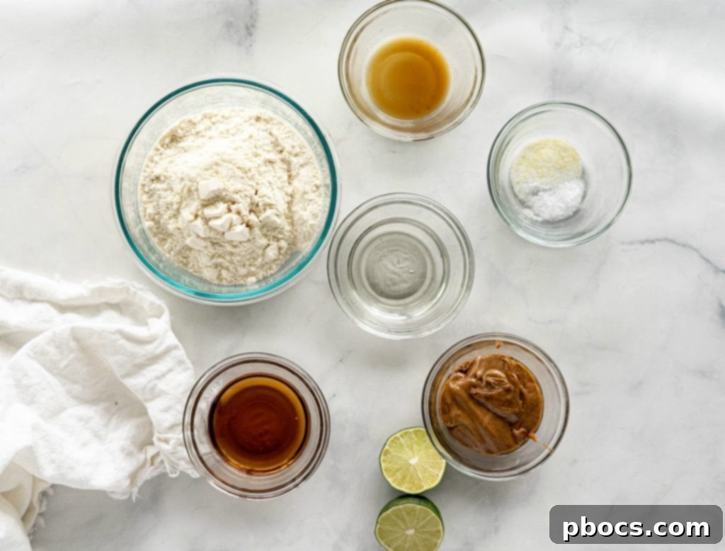 Refreshing Keto Key Lime Fat Bombs 8 All the individual ingredients for Keto Key Lime Fat Bombs meticulously laid out on a kitchen counter, ready for preparation.