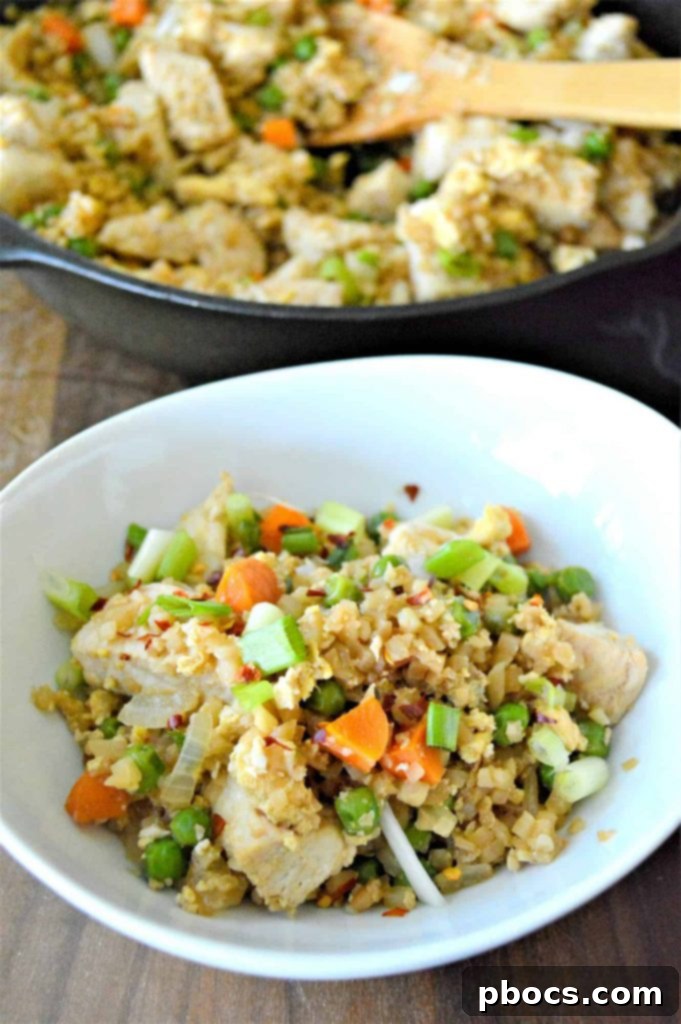 Delicious Keto Cauliflower Chicken Fried Rice served in a bowl