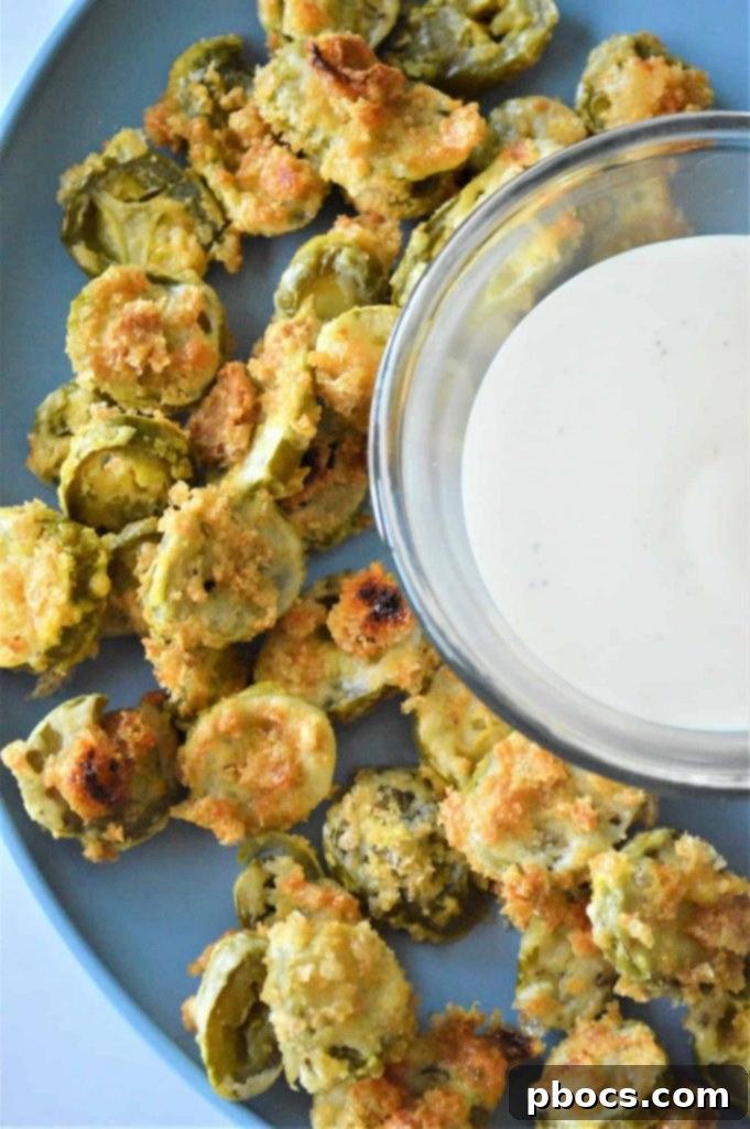 Close-up of baked Keto Jalapeño Chips on a wire rack.