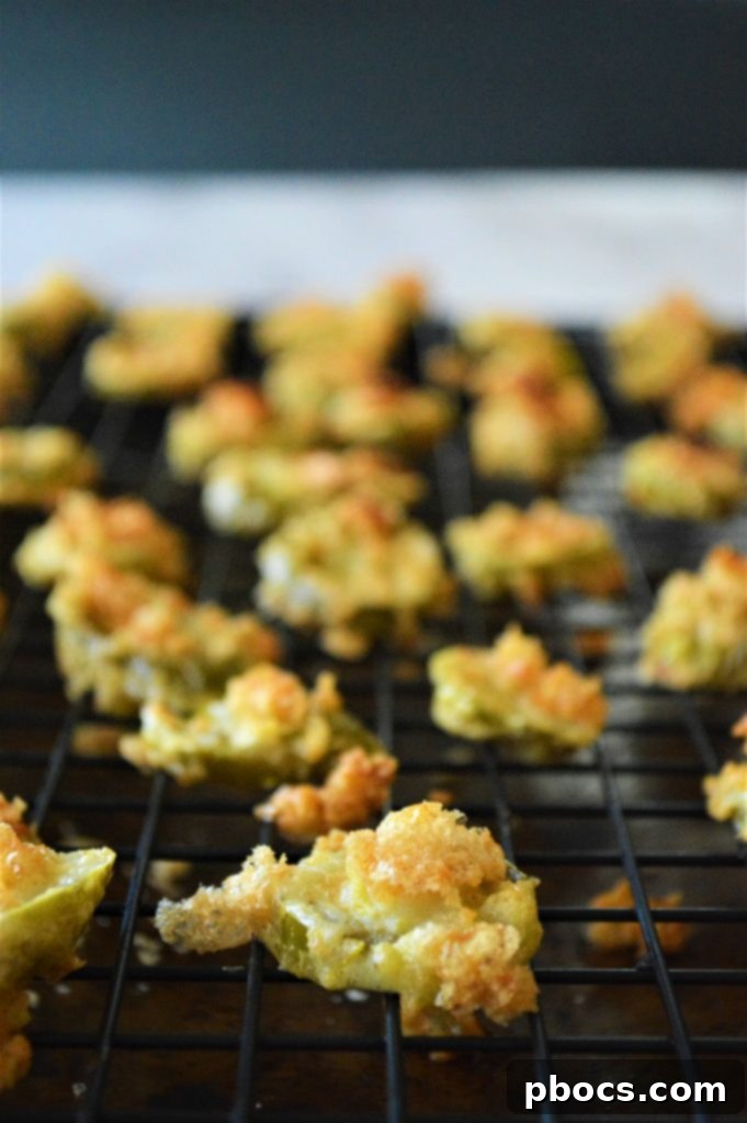 Freshly baked Keto Jalapeño Chips cooling on a wire rack.