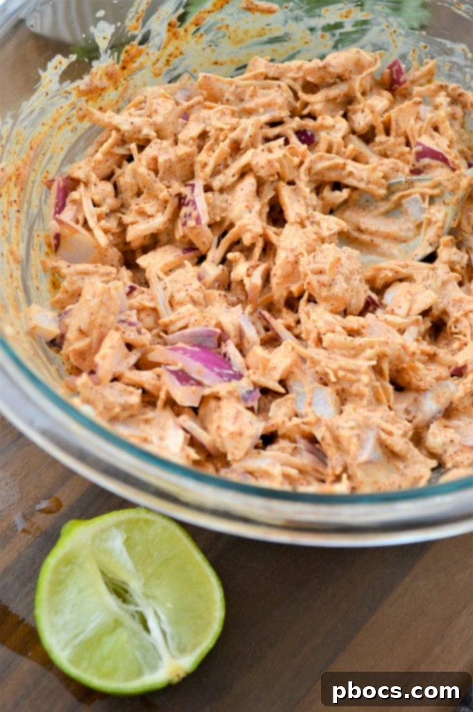 Garnishing Taco Chicken Salad