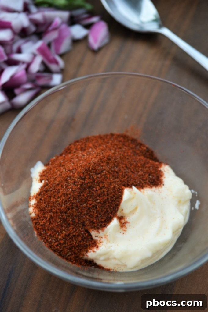 Mixing Spices for Taco Chicken Salad