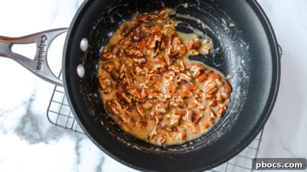 Add pecans to caramel mixture