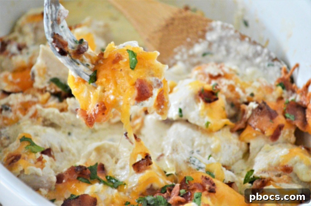 Serving of Keto Chicken Bacon Ranch Casserole with fresh parsley