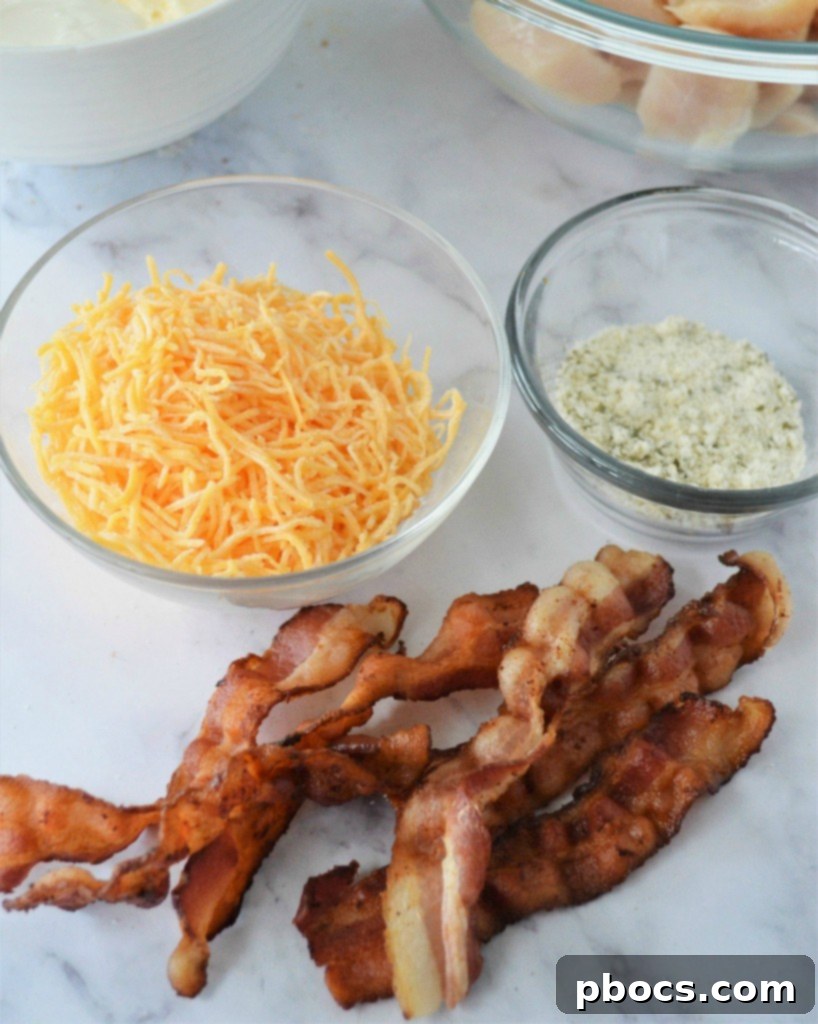 Ingredients for Keto Chicken Bacon Ranch Casserole laid out