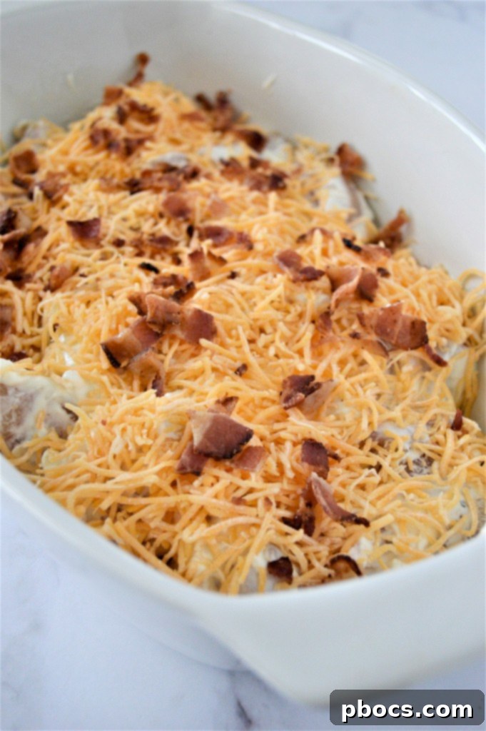 Transferring casserole mixture to the baking dish