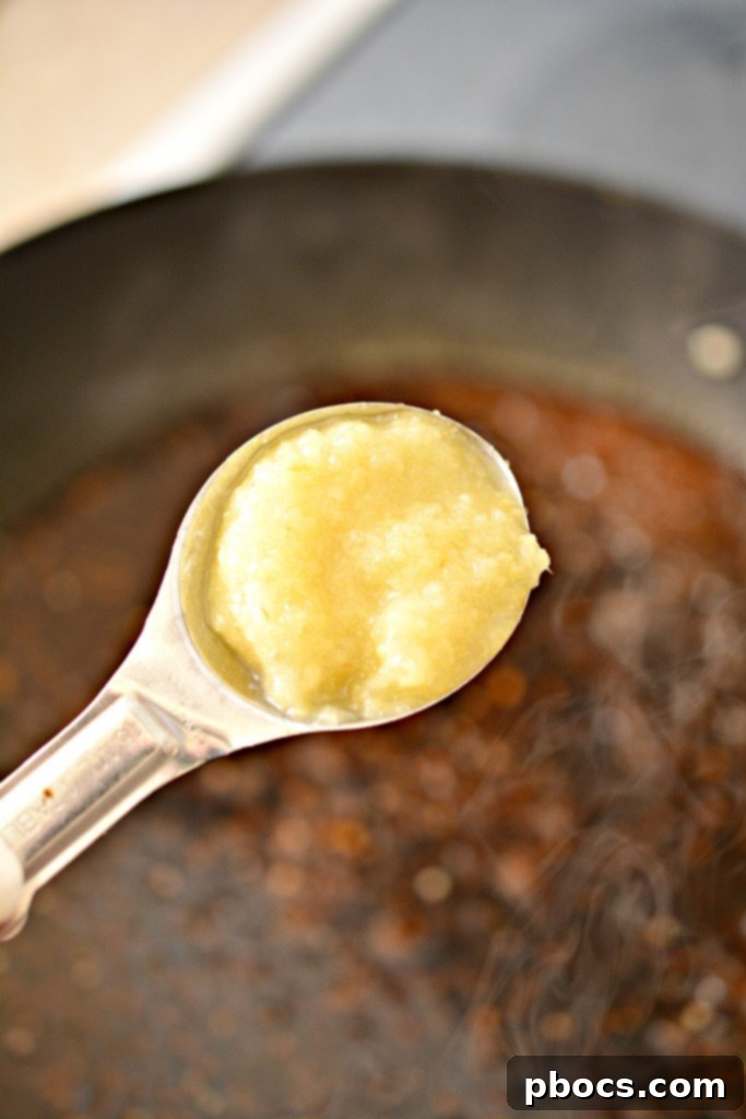 Removing Cooked Chicken from Skillet