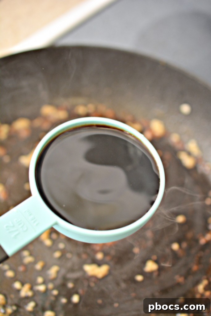 Chicken Thighs Cooking in Skillet