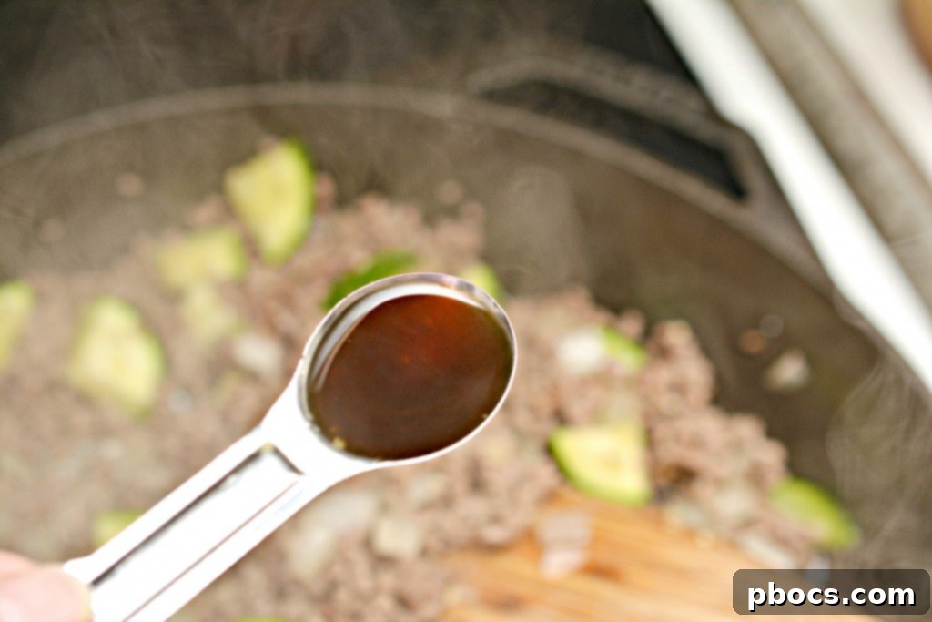 Cooking Onions and Zucchini with Beef