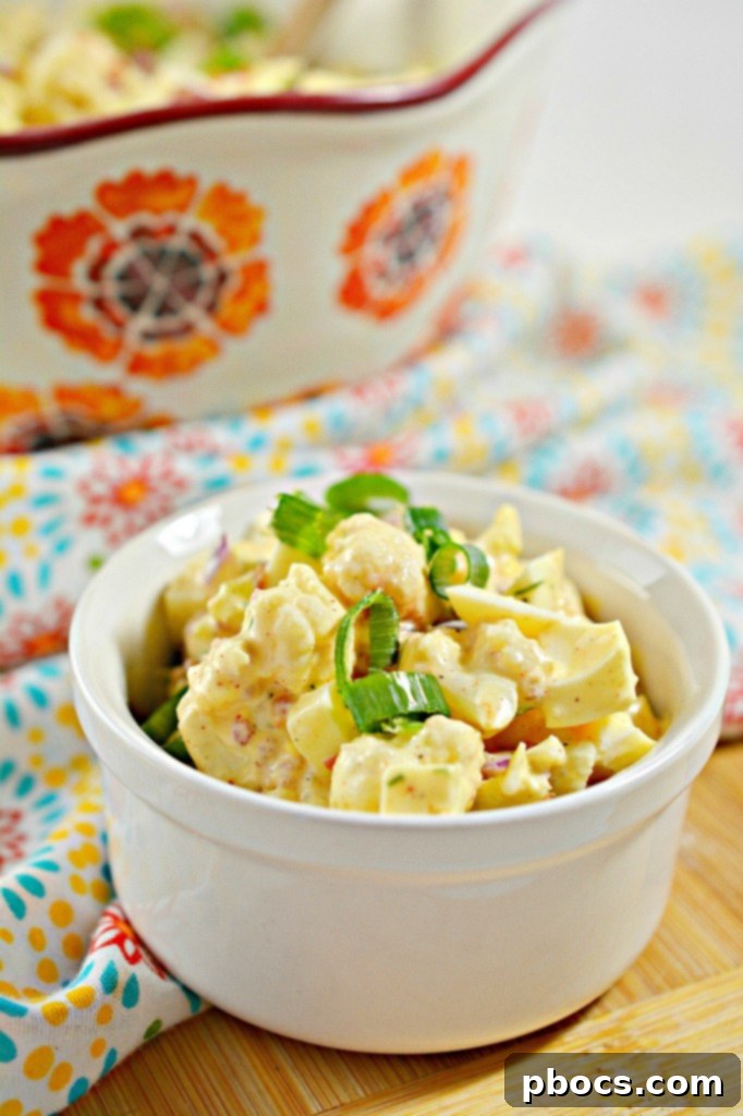 Close-up of Creamy Keto Deviled Egg Cauliflower Salad with Fresh Dill