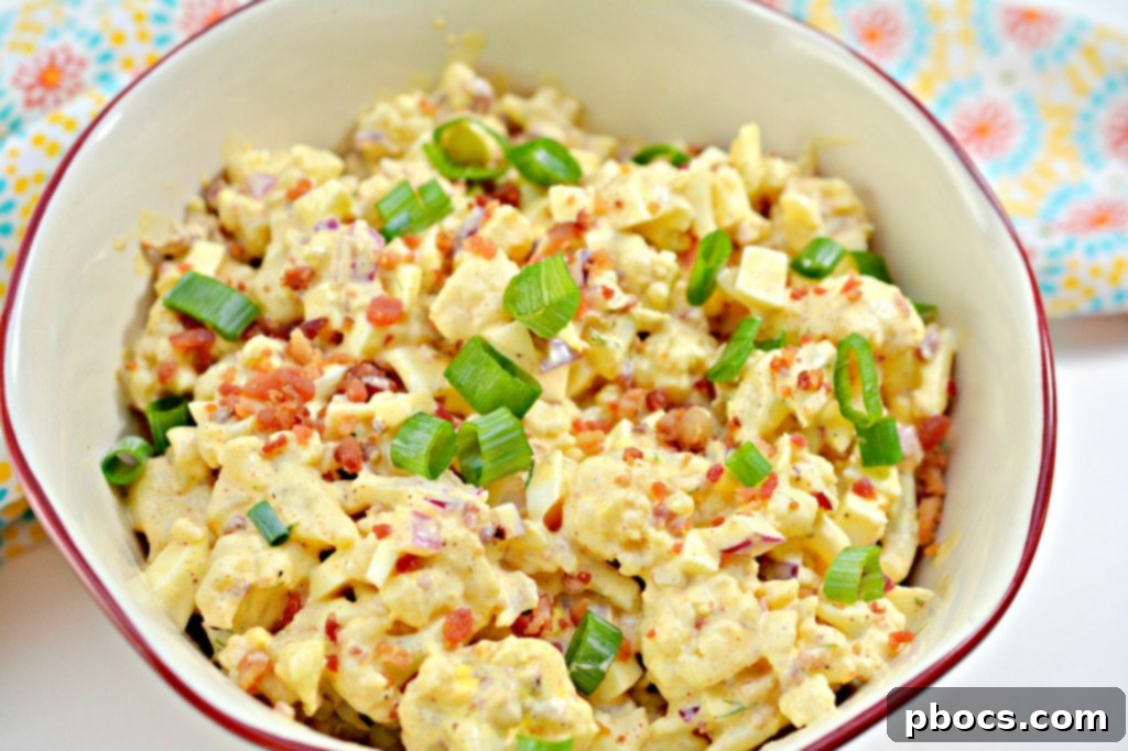 Finished Deviled Egg Cauliflower Salad Garnished with Green Onions