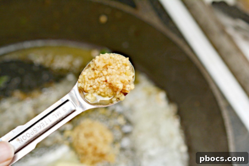 Step 4: Removing cooked chicken and vegetables from the skillet