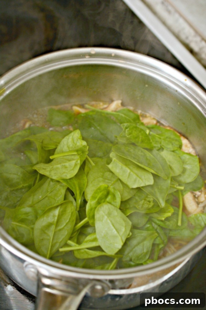 Keto Ramen Made Simple 12 Wilting spinach in hot ramen broth