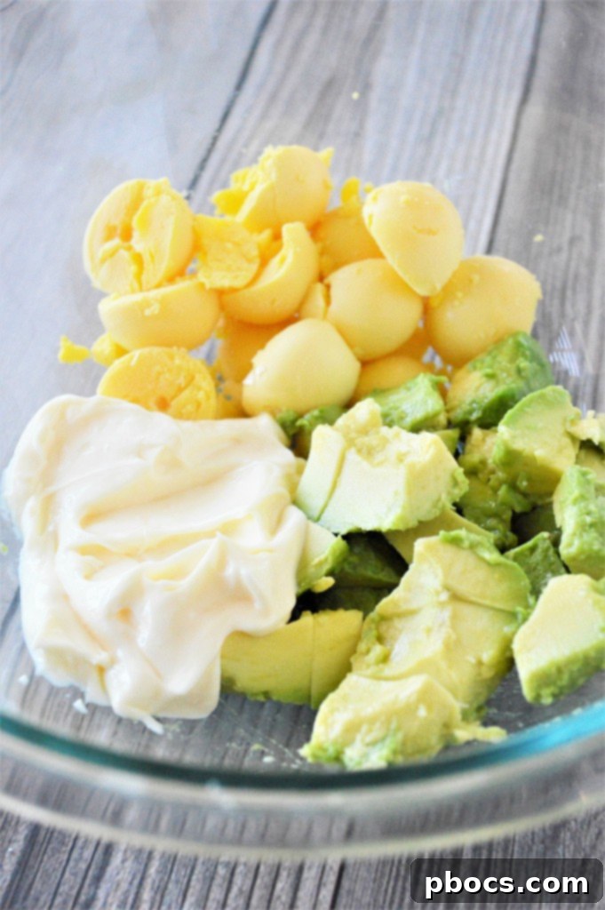 Zesty Keto Guacamole Deviled Eggs 9 Mixing Guacamole Filling for Deviled Eggs