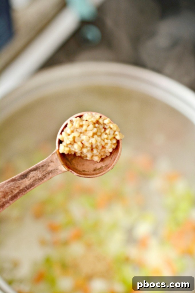 Adding garlic and Italian seasoning to pot pie vegetables