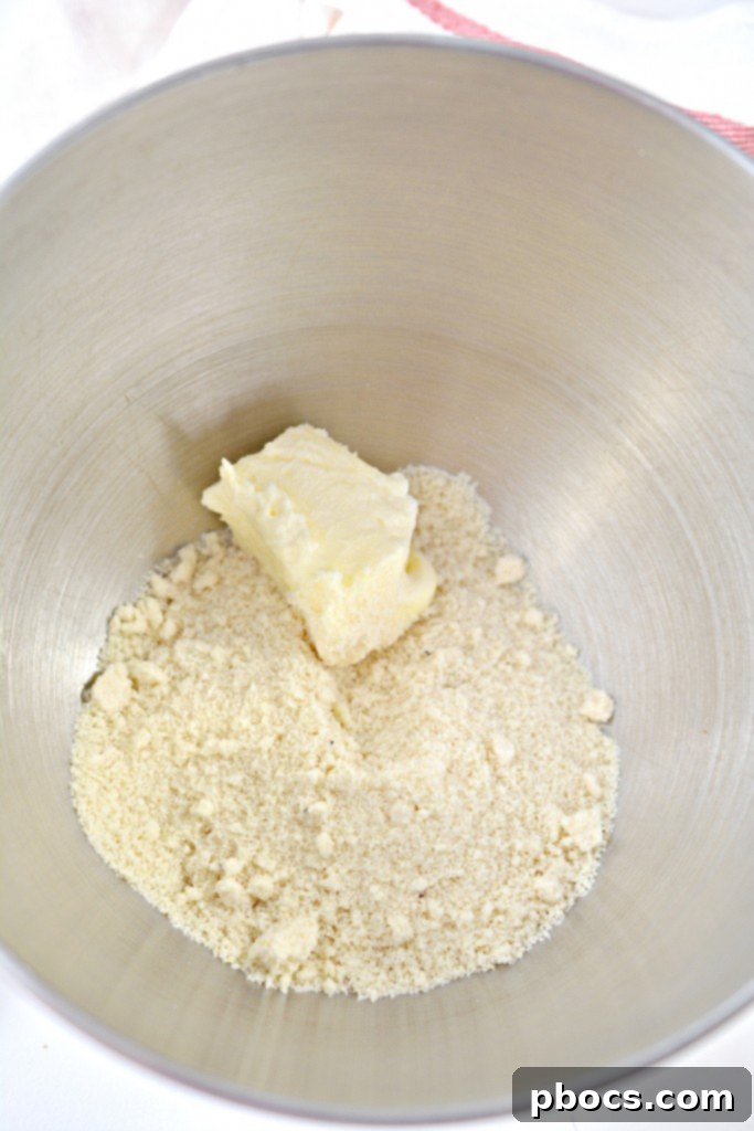 Mixing almond flour and cheese for the keto crust dough