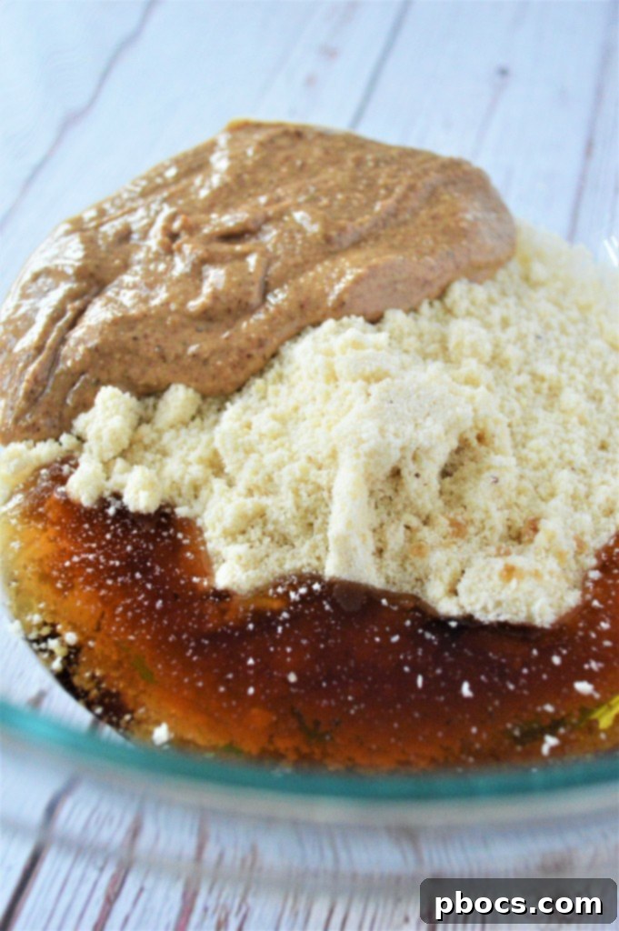 Mixing dry and wet ingredients for keto snickerdoodles
