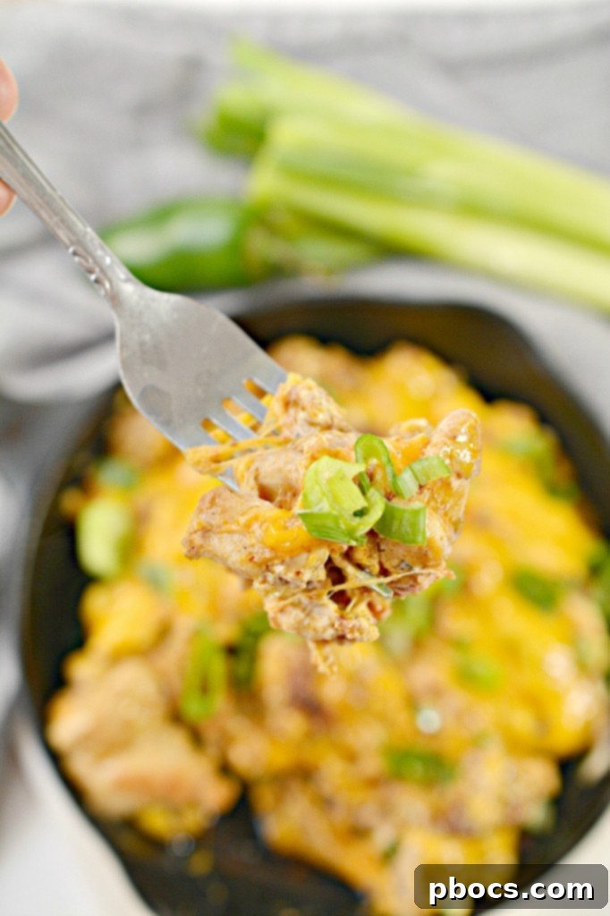 Keto Jalapeno Popper Chicken Skillet 5 A large skillet filled with the creamy, cheesy, and spicy Low Carb Jalapeno Popper Chicken mixture