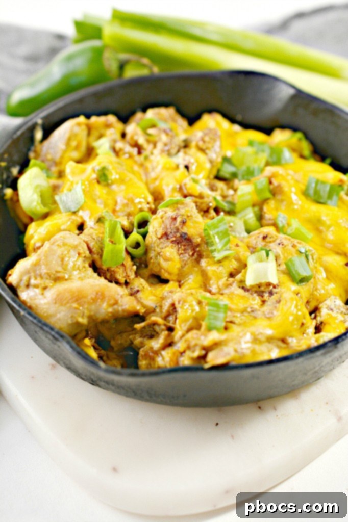 Keto Jalapeno Popper Chicken Skillet 7 Individual meal prep containers filled with generous portions of Low Carb Jalapeno Popper Chicken Skillet, ready for storage