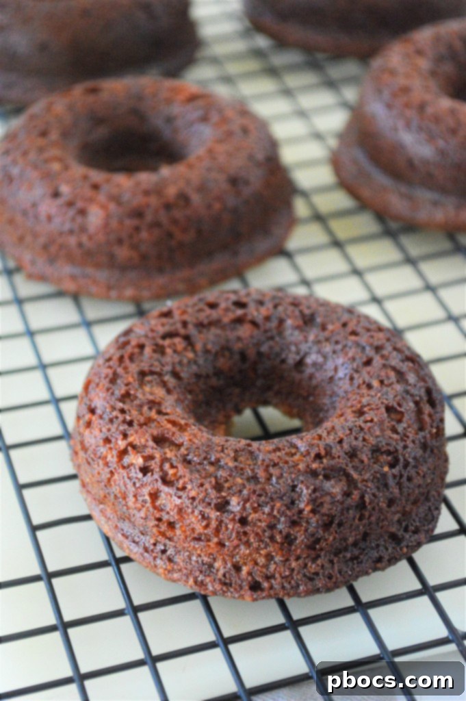 Baked keto gingerbread donuts in a pan