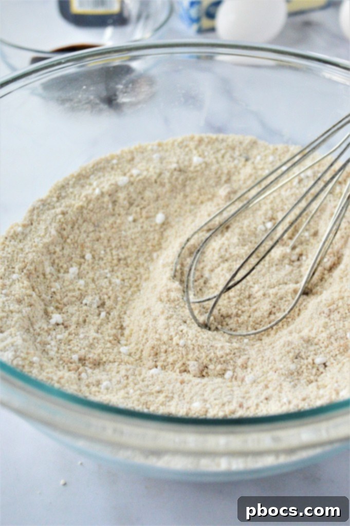 Whisking dry ingredients for keto gingerbread donuts