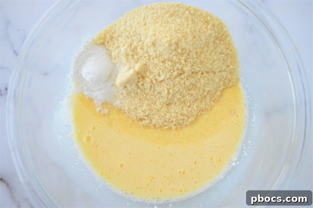 Keto Garlic Toast 8 Adding Eggs to Low Carb Bread Mixture