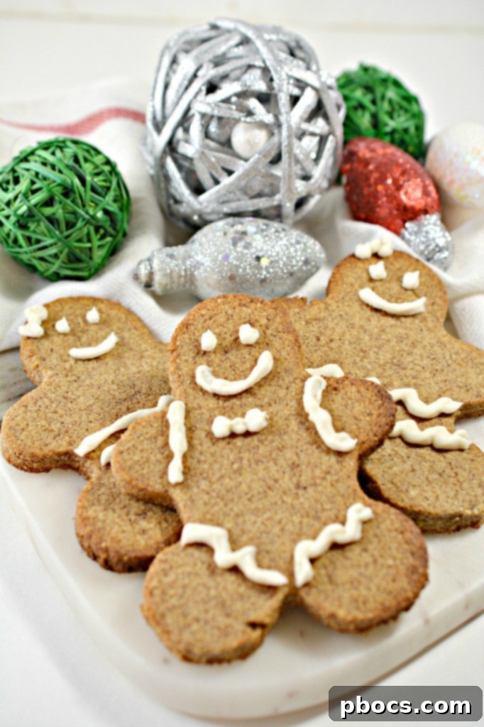 Festive Keto Gingerbread Snaps 2 Delicious Keto Gingerbread Cookies decorated for Christmas