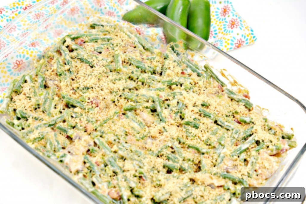Spicy Keto Jalapeno Popper Green Bean Casserole 15 Close-up of the finished Keto Jalapeno Popper Green Bean Casserole, golden brown and bubbling from the oven
