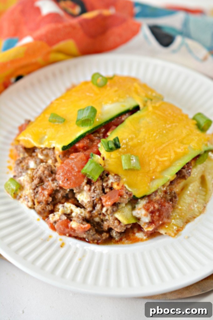 Cooked Keto Zucchini Taco Lasagna, showcasing its delicious layers and golden cheese topping.