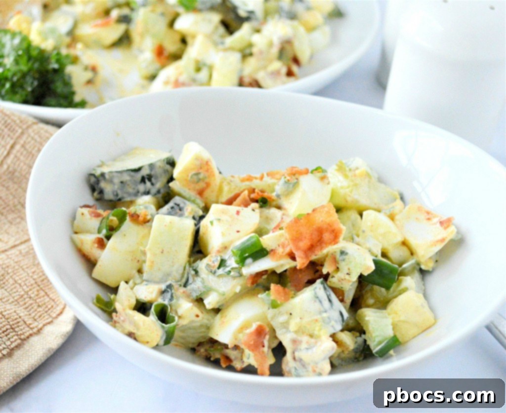 Stored Low Carb Cucumber Egg Salad in an airtight container, ready for meal prep.