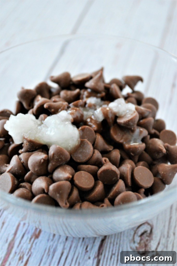 Effortless Keto Chocolate Peanut Butter Bars 10 Step 3: Spreading the peanut butter batter evenly into a parchment-lined pan.