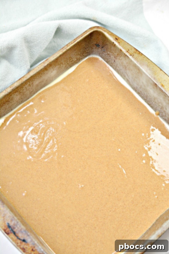 Adding vanilla extract to the fudge mixture