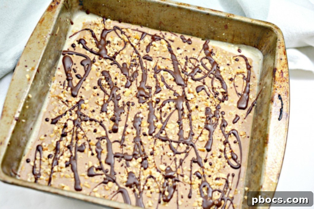 Melting chocolate chips and coconut oil for drizzle