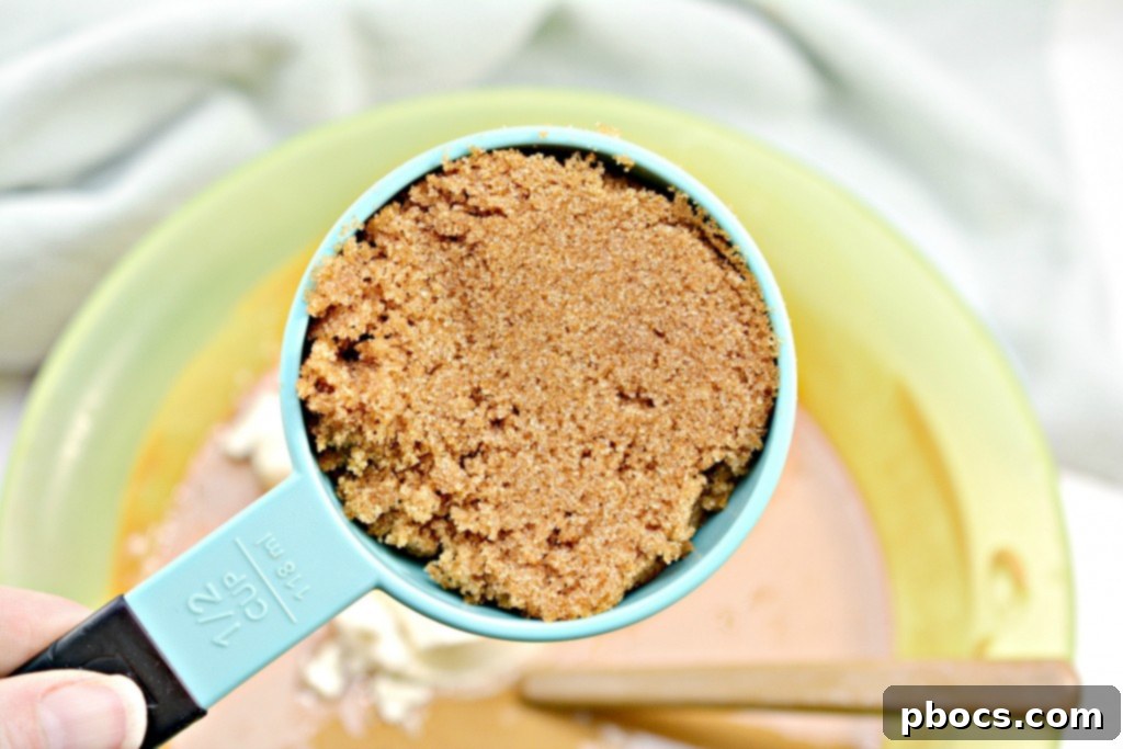 Adding protein powder and sweetener to the peanut butter mixture