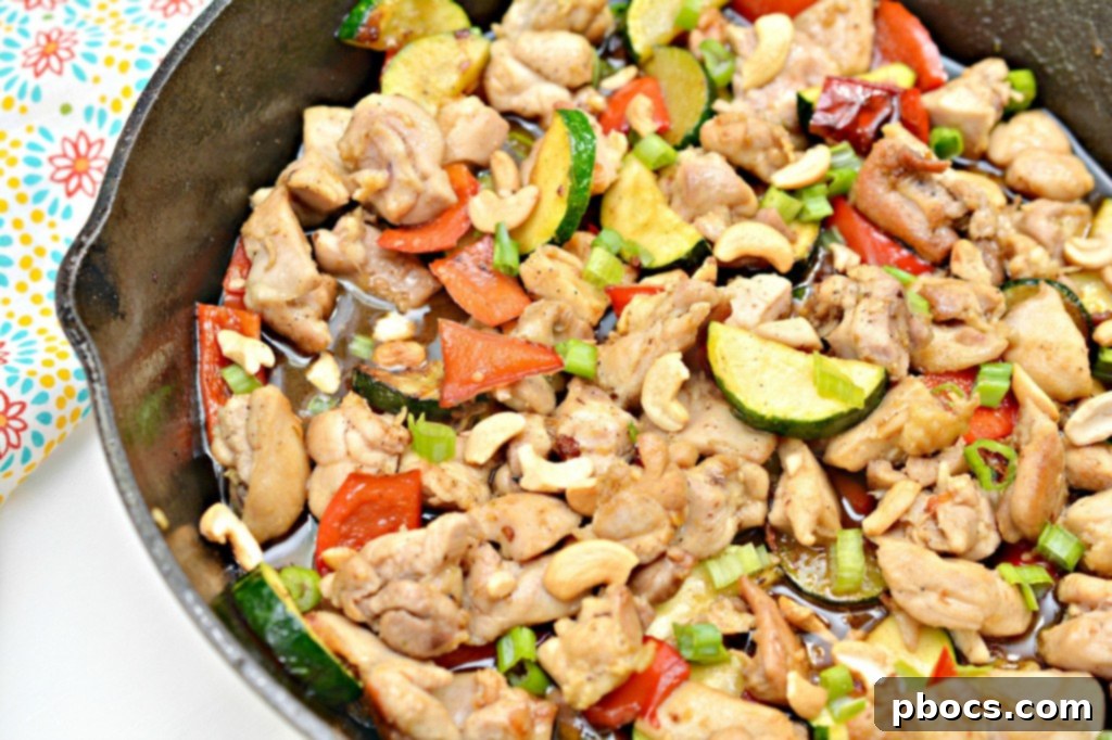 Close-up of Keto Kung Pao Chicken with vibrant vegetables and sauce.