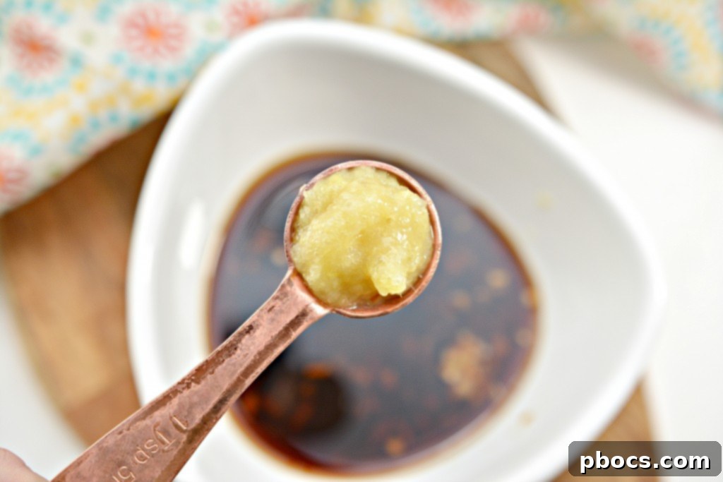 Sautéing bell peppers and zucchini in a skillet.