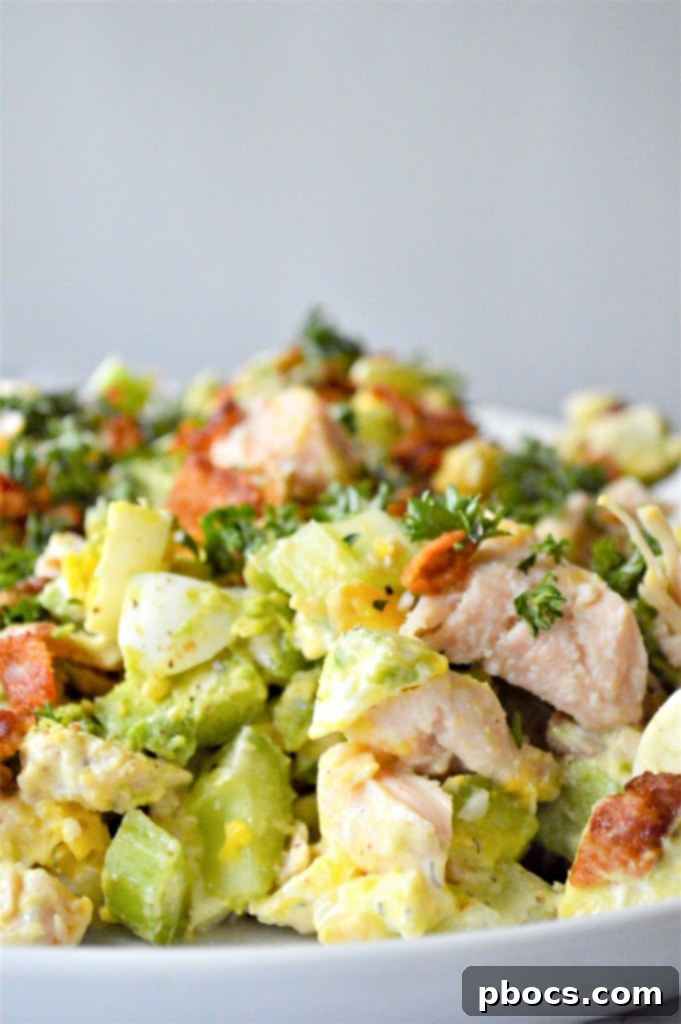 Creamy Low Carb Chicken Egg Salad made with chicken, hard boiled eggs, avocado, and bacon