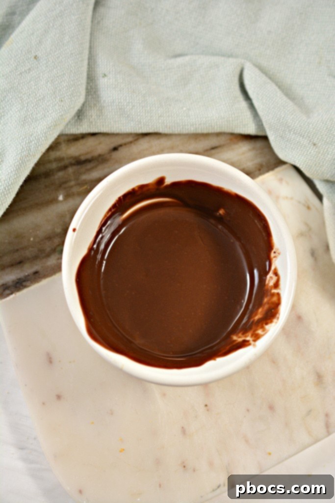 Effortless Keto Mug Cheesecake 13 Turning out the mug cheesecake onto a plate