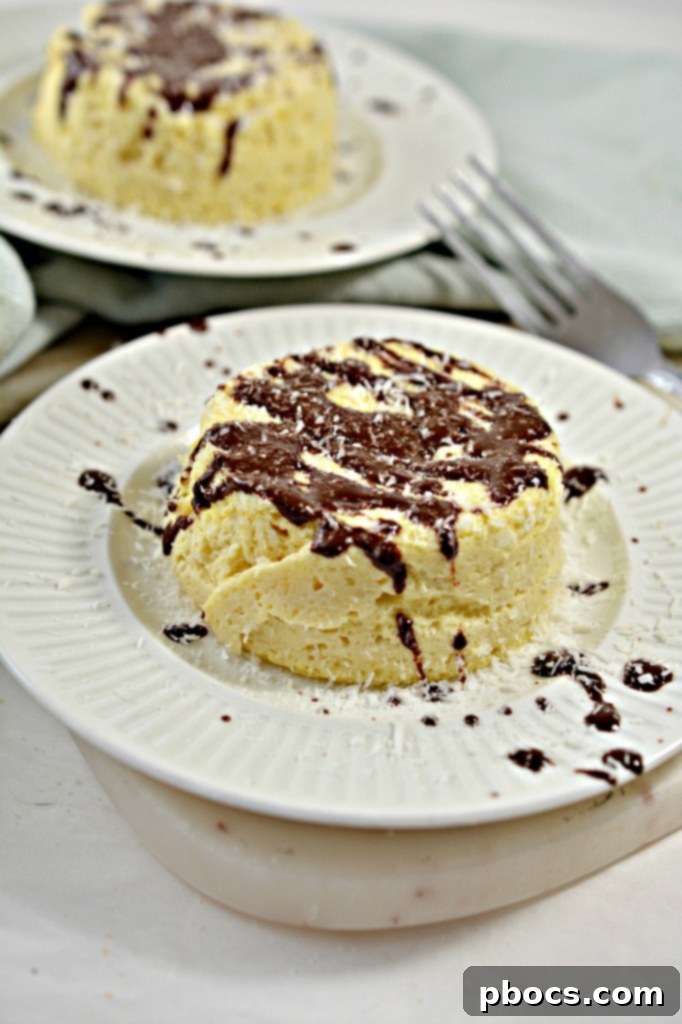 Effortless Keto Mug Cheesecake 6 A close-up shot of a healthy keto mug cheesecake, showing the fluffy texture