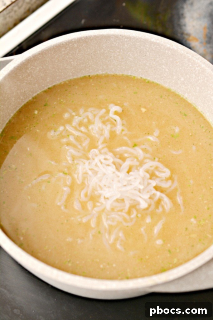 Simmering the creamy keto miso ramen broth