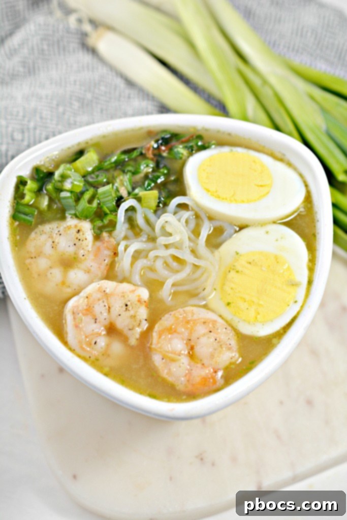 Assembling creamy keto miso ramen with various fresh toppings