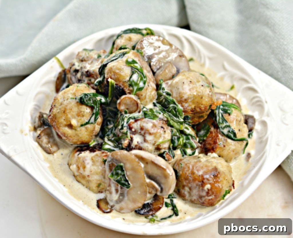 Flavor Packed Cajun Keto Chicken Meatballs 3 Close-up of golden brown Keto Cajun Chicken Meatballs in a skillet