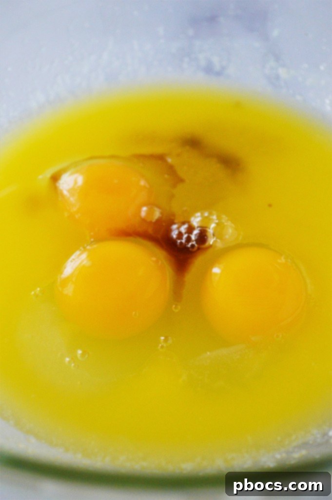 Eggs and vanilla extract added to the mixture