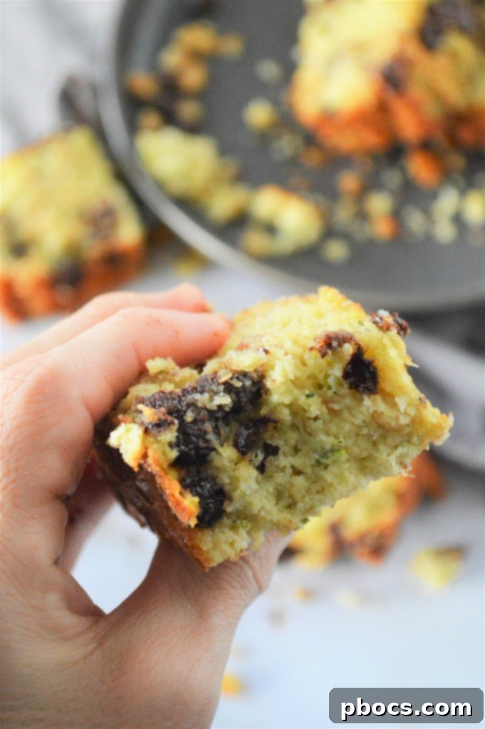 A whole loaf of Low Carb Chocolate Chip Zucchini Bread, ready to slice