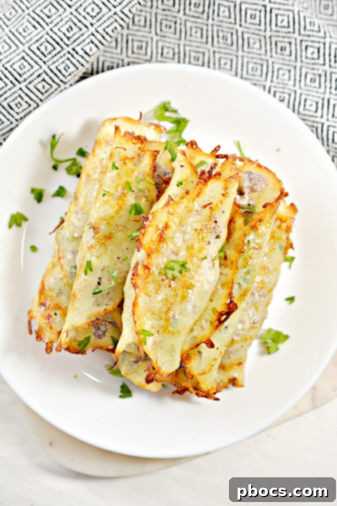 Fresh ingredients laid out for Keto Philly Cheesesteak Roll Ups: ground beef, bell peppers, onions, and cream cheese
